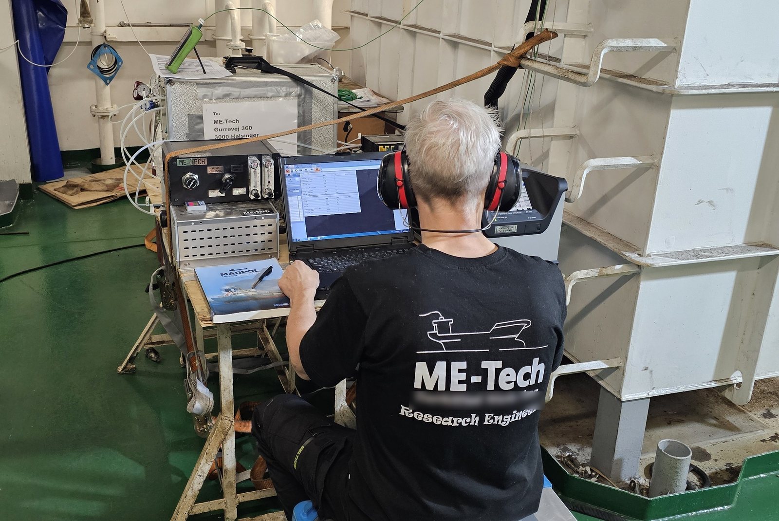 ME-Tech technician measuring onboard